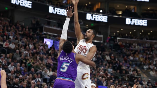Jan 10, 2023; Salt Lake City, Utah, USA; Cleveland Cavaliers forward Evan Mobley (4) shoots the ball over Utah Jazz guard Malik Beasley (5) during the first quarter at Vivint Arena. Mandatory Credit: Chris Nicoll-USA TODAY Sports